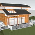 Two Story Wooden House With Black Roof Large Glass Windows White Railings And Lawn