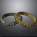 Stylish Silver and Gold Fashion Accessory Rings with Decorative Studded Details