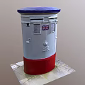Traditional Postbox With Blue Lid White Body Red Base On Stone Pavement