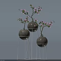 Pink Flowering Plants in Spherical Pots on White Metal Stands