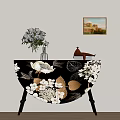 Decorative Black Semicircular Locker with White Gold Patterns Vase Flowers and Teapot Near Wall Painting