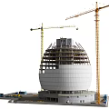 Dome Shaped Building Under Construction With Tall Cranes Scaffolding And Equipment