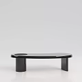 Modern Black Coffee Table With Sleek Circular Top And Cylindrical Legs Design