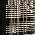 Modern Wine Cabinet With Numerous Neatly Arranged Wine Bottles Marble Countertop Wooden Floor