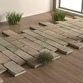 Rockery Stones Arranged On Wooden Floor With Small Grass And Green Plants By Window