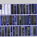 Collection Of Various Electronic Remote Controls With Different Designs And Models