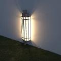 Modern Outdoor Wall Light With Grid Design Illuminating White Wall And Grass Area