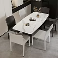 Modern Dining Table Set with Marble Top and Black White Chairs in Contemporary Interior
