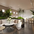 Lounge Area Interior Design With Comfortable Seating Green Plants Natural Light And Coffee Table