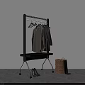 Black Rolling Clothes Rack with Gray Coats Lower Shelf High Heels and Woven Basket