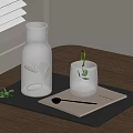 Refreshing Water With Lemon Slices In Glass Bottle And Cup On Black Tray Wooden Table