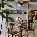 Cozy Dining and Living Room Interior With Wooden Ceiling Sofa Pillows And Green Plants