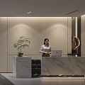 Modern Front Desk Reception Area With Marble Desk Receptionist Green Plant And Decorative Sculpture