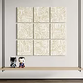 Modern Wall Art With Abstract Pattern Paintings On White Wall And Wooden Shelf With Figurines