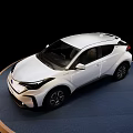 White Modern Car With Sleek Exterior Design And Alloy Wheels On Display Platform