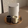 White Kettle With Two Mugs On Wooden Tray And Geometric Decorative Painting
