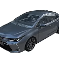 Gray Four Door Sedan With Streamlined Body Design And Alloy Wheels Front Grille