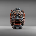 Intricately Carved Traditional Mask Sculpture Featuring Ornate Details And Bold Design