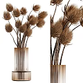 Brown Dried Flowers Placed in Vertical Striped Golden Vase for Decorative Home Use