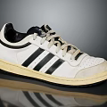 Vintage White Athletic Shoes With Black Stripes Beige Laces And Cream Sole