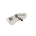 Modern Sectional Sofa in Gray and White with Soft Blanket and Pillows 3d model
