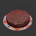 Delicious Chocolate Cake with Chocolate Frosting and Colorful Sprinkles on Floral Pattern Plate Black Background