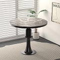 Round Marble Dining Table with Black Pedestal Base near Window Blinds and Vogue Artwork