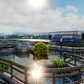 Tranquil Garden Landscape with Pond Stones Green Plants and Wooden Fence in Sunlight