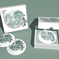 Chinese Green Tea Cakes In Opened White Boxes With Traditional Landscape Art
