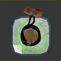 Medical Device Transparent Reagent Bottle Containing Green Liquid With Cork Stopper And Red String