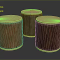 Three Cylindrical Wooden Stools With Round Tops And Different Wood Textures