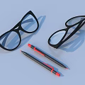 Everyday Living Items Including Black Glasses And Two Pens With Red Tips 3d model