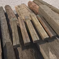 Rough Stone And Solid Wooden Logs For Construction And Decorative Projects 3d model