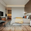 Modern Bedroom Interior With Comfortable Bed Yellow Blanket Pillows Nightstand Lamp Chair And Wooden Floor