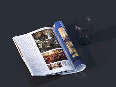 Open Magazine Featuring Interior Photos And Glass Cup On Dark Surface 3d model