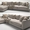 Light Beige Sectional Sofa With Plush Pillows And Cozy Throw Blanket In Modern Living Room