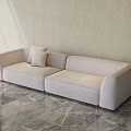Beige Sectional Sofa With Accent Pillow On Marble Floor Against Neutral Wall 3d model