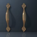 Shiny Golden Furniture Handles Featuring Intricate Decorative Patterns For Cabinet Drawers