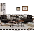 Stylish Black Leather Sofa With Brown Coffee Table Decorative Pillows Table Lamp And Area Rug