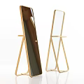 Two Modern Standing Mirrors With Golden A Shaped Stand And Dark White Reflective Surfaces