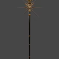 Detailed Golden Ornate Weapon With Intricate Floral Design And Black Shaft