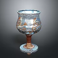 Decorative Blue And Gold Goblet With Spiral Patterns Sun Motifs And Intricate Base
