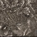 Underground Cave Interior With Sharp Stalagmites Water Pool And Rocky Surfaces