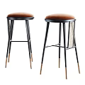Modern Stylish Bar Stools With Brown Cushioned Seats Black Metal Legs And Gold Accents