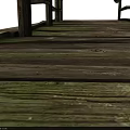 Old Wooden Bridge With Moss Covered Railings And Support Posts