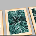 Set of Four Modern Botanical Paintings With Golden Frames And Tropical Green Leaves