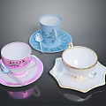 Colorful Tea Cups Saucers and Spoons with Pink Blue White Patterns and Gold Trim