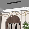 Modern Curved Chandelier in Contemporary Interior with Arched Wooden Door and Potted Plant
