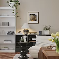 White Single Sofa with Brown Blanket in Living Room Beside White Bookshelf and Table Lamp