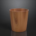 Wooden Cylindrical Trash Can With Natural Wood Grain Surface On Dark Background